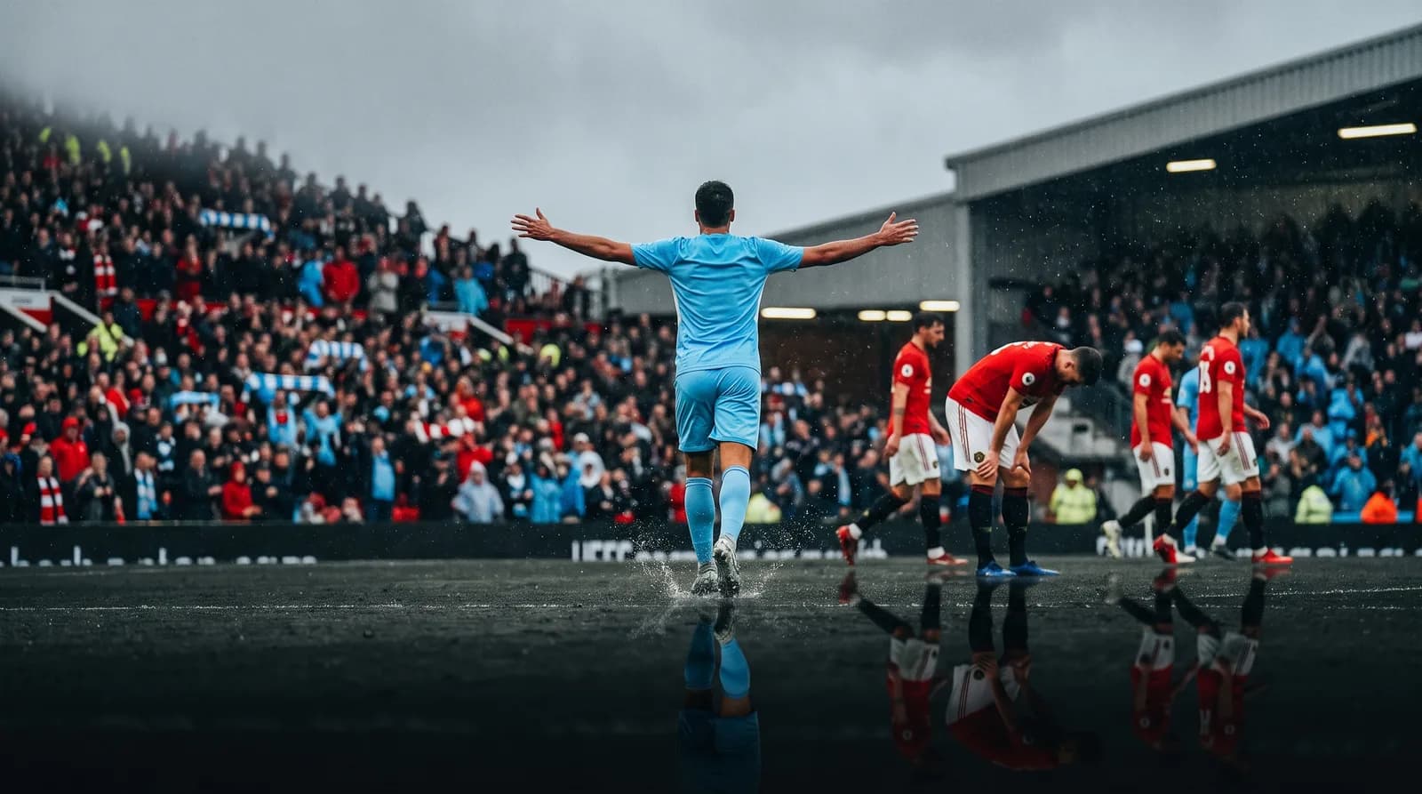 Sky-blue striker celebrates a goal in the rain in front of defenders in red during a derby