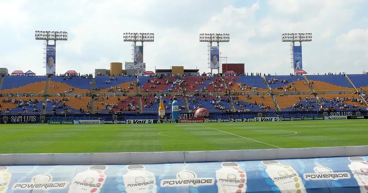 General view of an empty football stadium's pitch and stands before kickoff