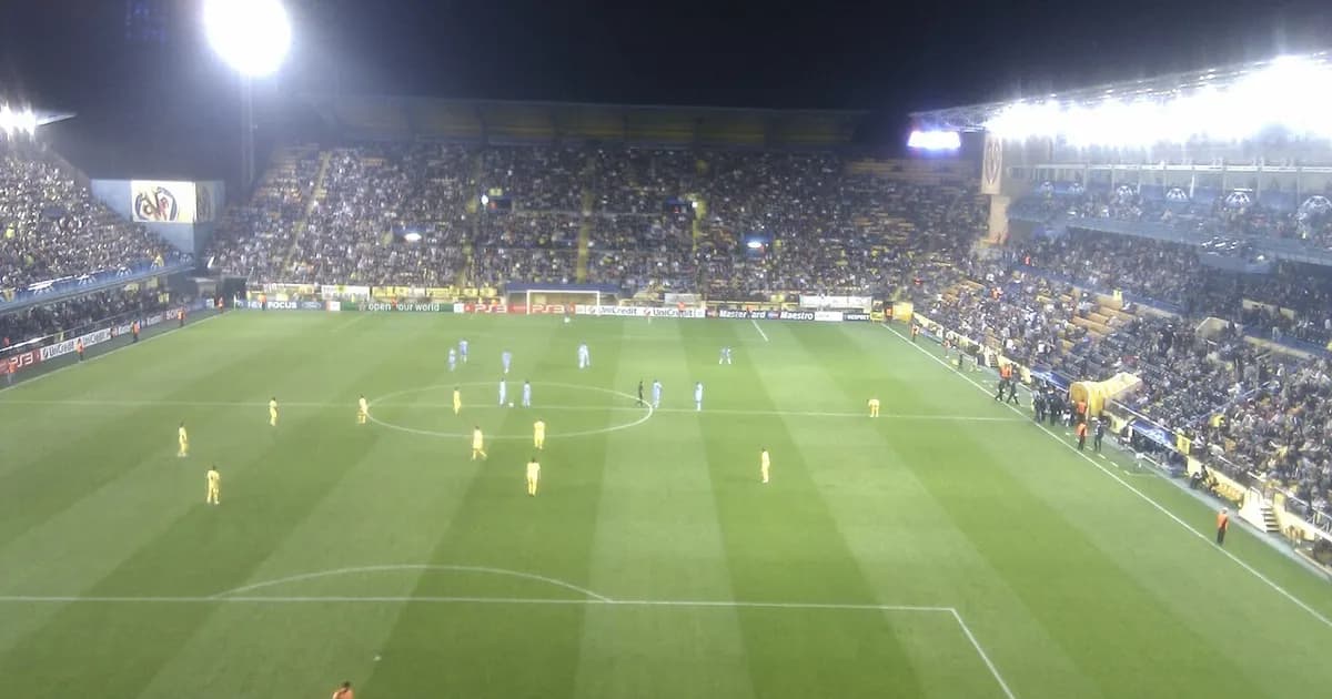General view of a football stadium with fans in the stands ahead of kickoff